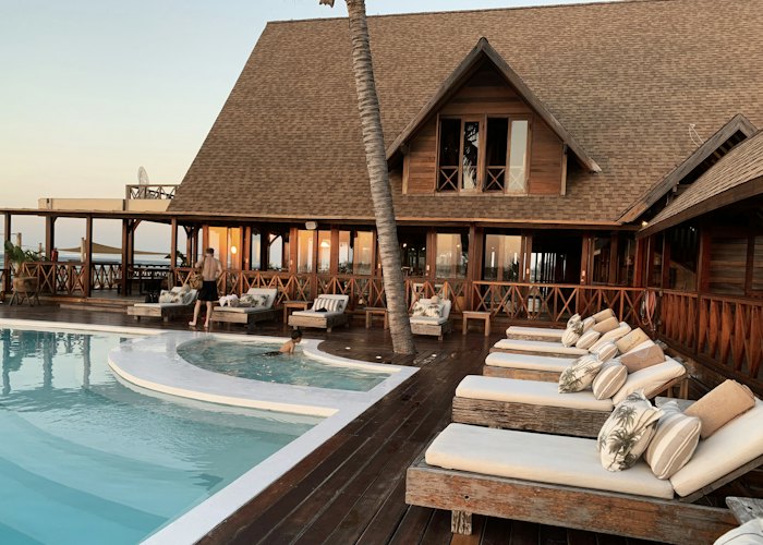 Resort pool deck with lounge chairs