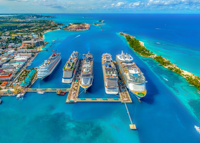 Cruise ships docked in turquoise water